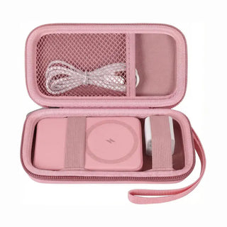 A pink wireless charging kit with a charger, USB cable, and power adapter in a pink carrying case.