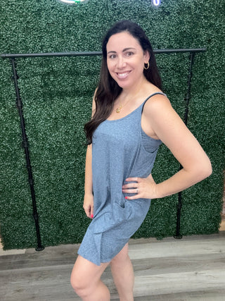 Cozy Co Dual layered sleeveless mini dress with patch pockets