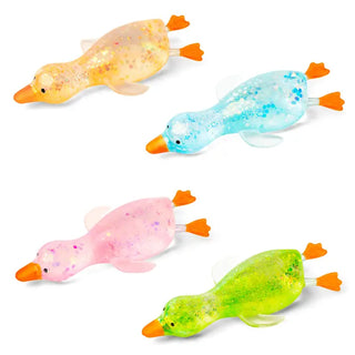 Four colorful goose-shaped squishy toys in yellow, blue, pink, and green.