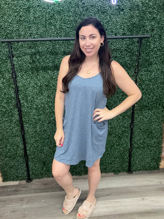 Cozy Co Dual layered sleeveless mini dress with patch pockets