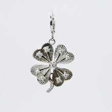 Load image into Gallery viewer, Treasure Jewels Trebol Charm In Silver &amp; Gold

