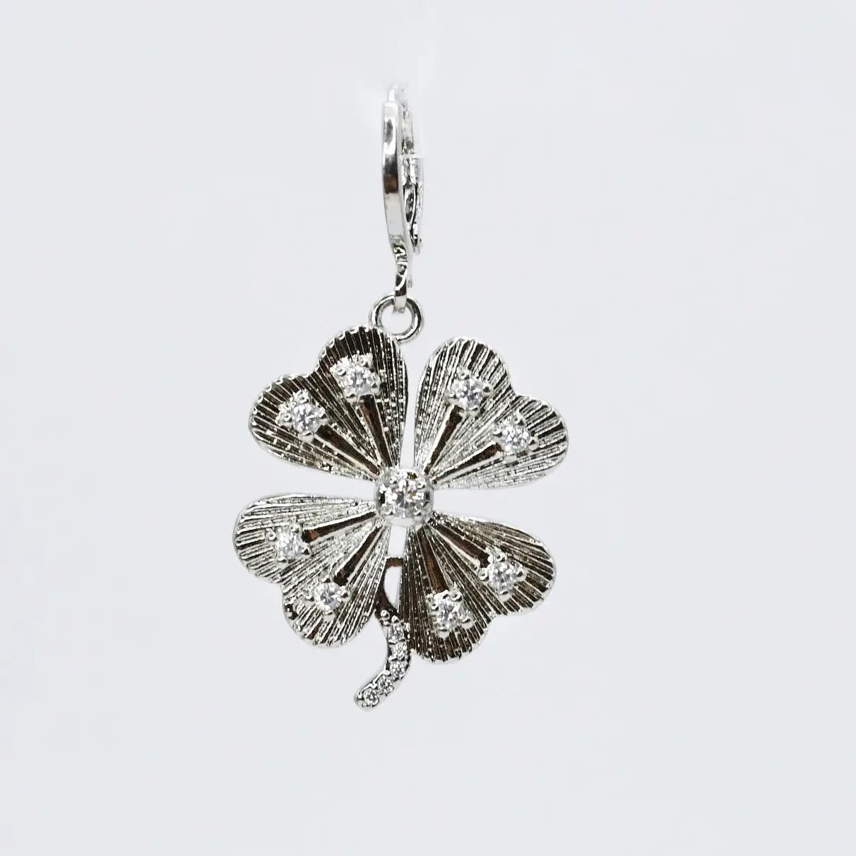 Treasure Jewels Trebol Charm In Silver & Gold
