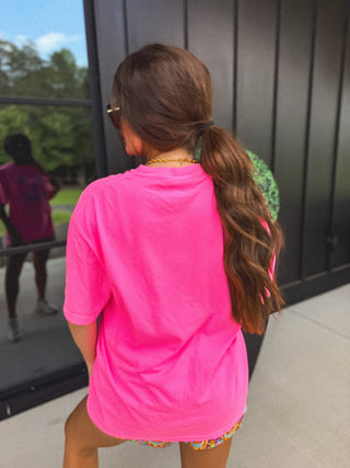 Checkered Pumpkin Face Graphic Tee on Neon Pink