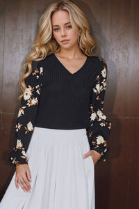 Heimish V-Neck Ribbed Knit Top with Floral Print Sleeves – Black