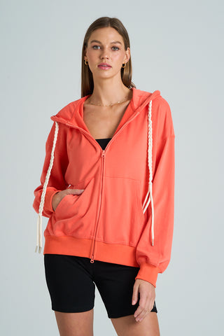 Coral French terry hoodie with braided drawstring and full zip closure.