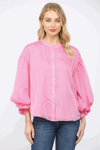 A pink pinstripe blouse with voluminous bubble sleeves and a button front.