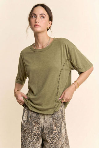 Khaki olive tee with braided seam details and drop shoulder fit worn by a model.