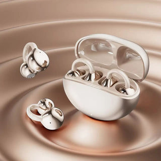 Rose gold open ear clip-on earbuds with a sleek charging case.
