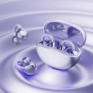Purple open ear clip-on earbuds with ergonomic design and a sleek charging case.
