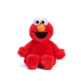 Elmo plush toy in red, designed for warmth and cuddles, officially licensed by Sesame Street.