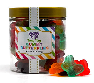 Jar of mini gummy butterflies in assorted colors with a yellow lid.