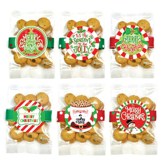 Six bags of chocolate chip cookies with various holiday-themed labels and ribbons.