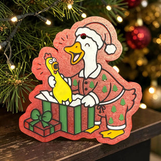 Multi-colored Christmas Goose Freshie with festive design, featuring a goose in pajamas and a rubber chicken.