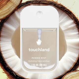 Touchland Beach Coco Power Mist Hydrating Hand Sanitizer in a compact, sleek bottle with a coconut background.