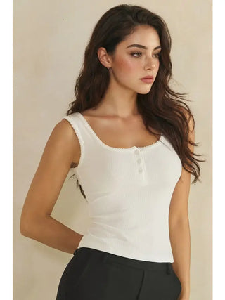 White ribbed tank top with a scoop neckline and button front detail.