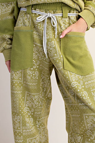 Matcha-colored bandana print terry barrel pants with drawstring waist and pockets.
