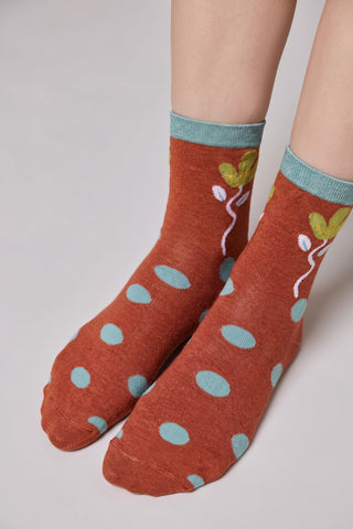 Multicolor crew socks with playful patterns and a comfortable fit.