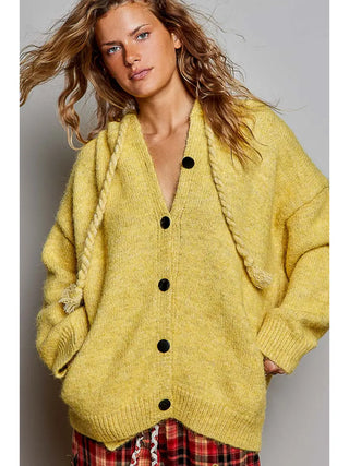 Honey-colored knit cardigan with braided drawstring hood and button front.