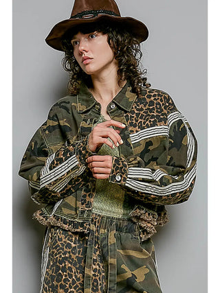 A model wearing a mixed camo and leopard print shirt jacket in olive.