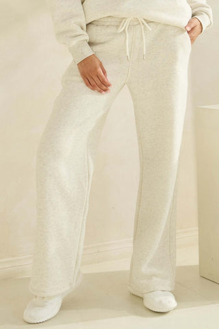 Heather gray fleece sweatpants with a relaxed fit and drawstring waist.