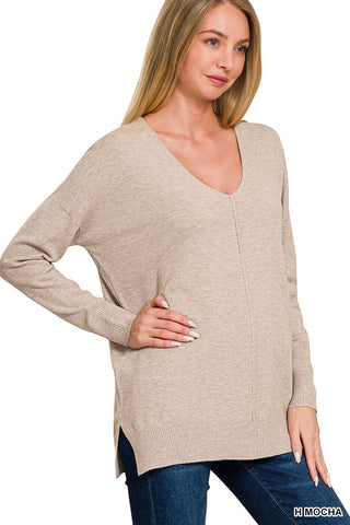 Heathered mocha sweater with a front seam detail, worn by a model.