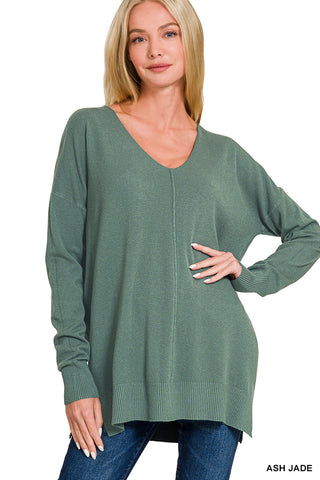 A relaxed fit sweater in Ash Jade with a v-neckline and front seam detail.