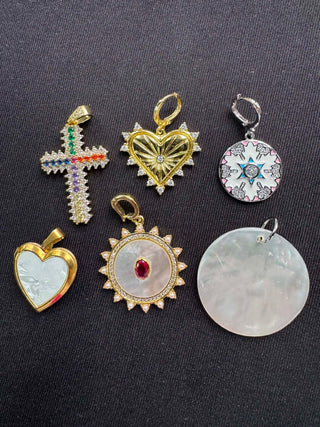 Assorted Heart, Cross, and Celestial-inspired charm pendants