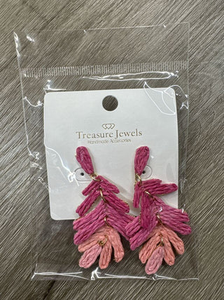 Handcrafted earrings in shades of pink with a layered, leaf-like design.