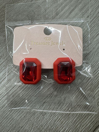 Bold red jewel earrings with a rectangular design set in a red frame.