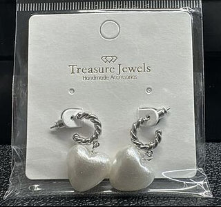 Heart drop earrings with silver twisted hoops and pearl-like hearts.