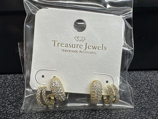 Silver shell earrings with a polished finish and post back closure.
