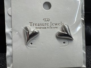 Silver heart-shaped stud earrings displayed on a card.