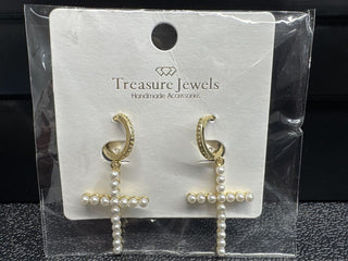 Gold-tone earrings with pearl cross design and post back closure.